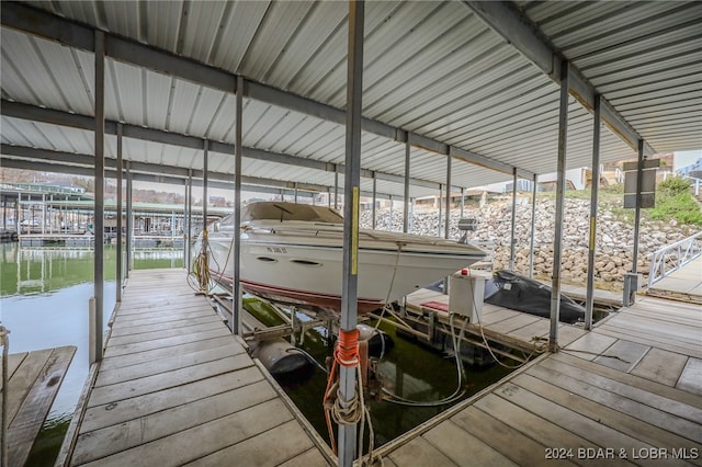 dock area with a water view