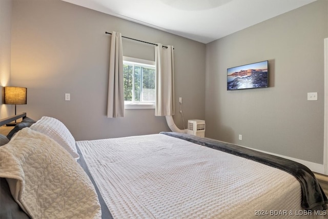 bedroom with baseboards