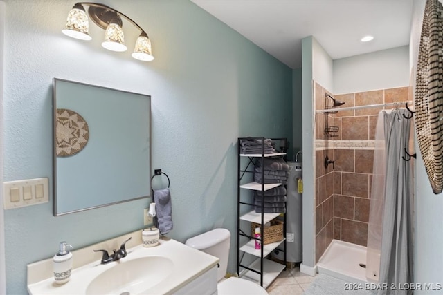 bathroom with curtained shower, tile patterned flooring, vanity, and toilet