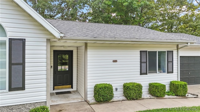 entrance to property with a garage