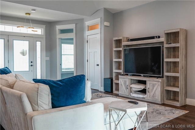 living room with dark hardwood / wood-style floors