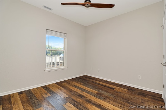 empty room with ceiling fan and hardwood / wood-style flooring