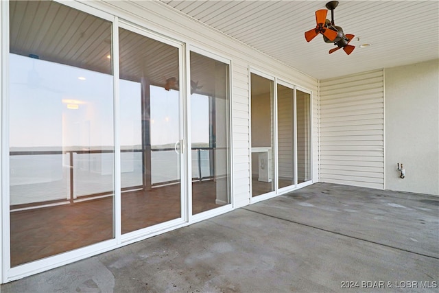 exterior space featuring ceiling fan