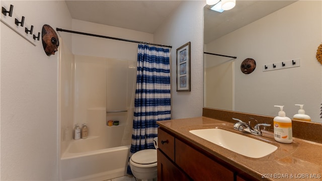 full bathroom with vanity, toilet, and shower / bath combo with shower curtain