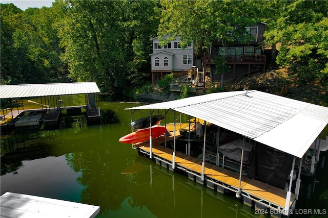 dock area with a water view