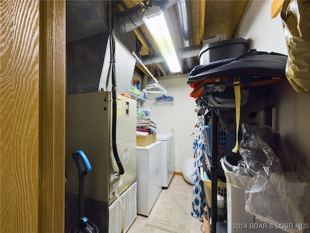 laundry room featuring separate washer and dryer