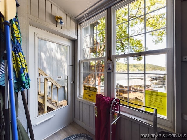 doorway with hardwood / wood-style floors