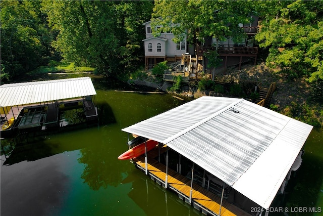 dock area with a water view