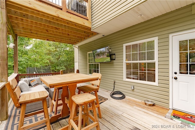 deck with a trampoline