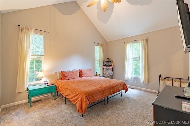 bedroom featuring ceiling fan, carpet flooring, and high vaulted ceiling