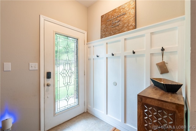 mudroom featuring light tile patterned flooring