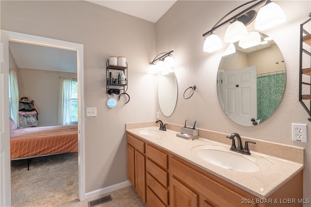 bathroom featuring vanity and tile patterned floors