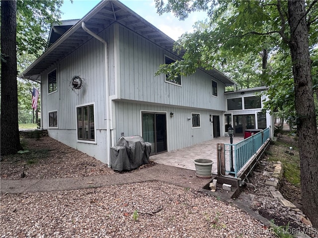 rear view of house with a patio area