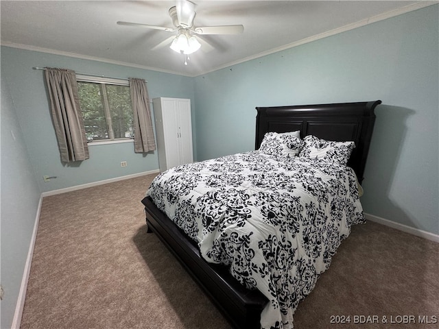 bedroom featuring ceiling fan, ornamental molding, and carpet flooring