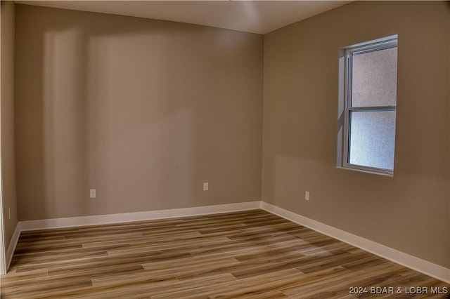 empty room with light wood-type flooring