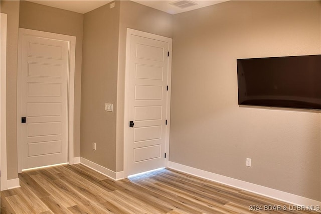 interior space with light hardwood / wood-style flooring