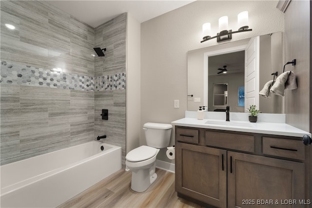1184 Jeffries Rd Unit 519, Osage Beach, MO 65065 - bathroom with vanity, wood finished floors, shower / washtub combination, and ceiling fan