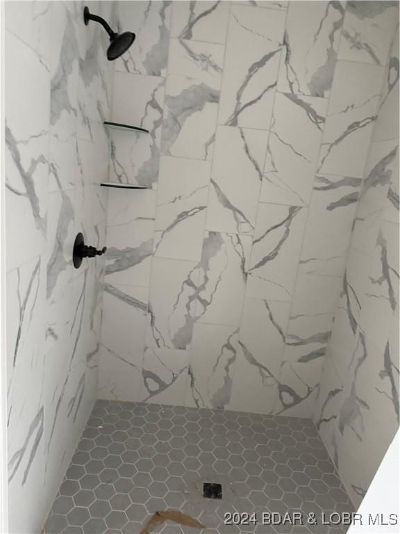 17023 Seminole Dr W, Rocky Mount, MO 65072 - bathroom featuring a marble finish shower