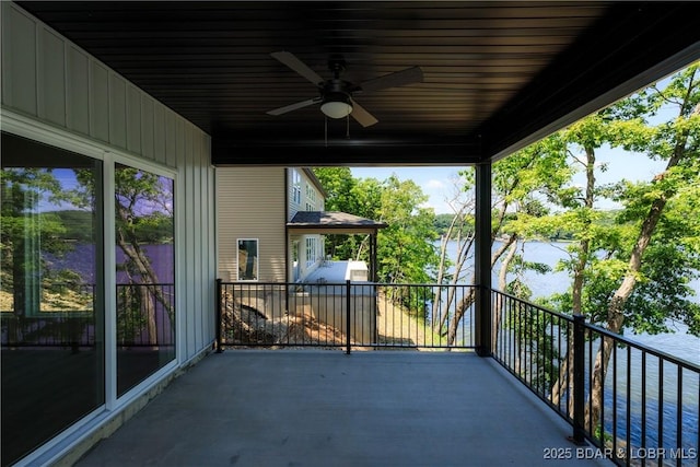 17023 Seminole Dr W, Rocky Mount, MO 65072 - balcony featuring ceiling fan and a water view