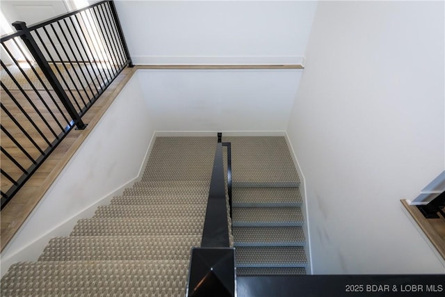 17023 Seminole Dr W, Rocky Mount, MO 65072 - stairs featuring baseboards