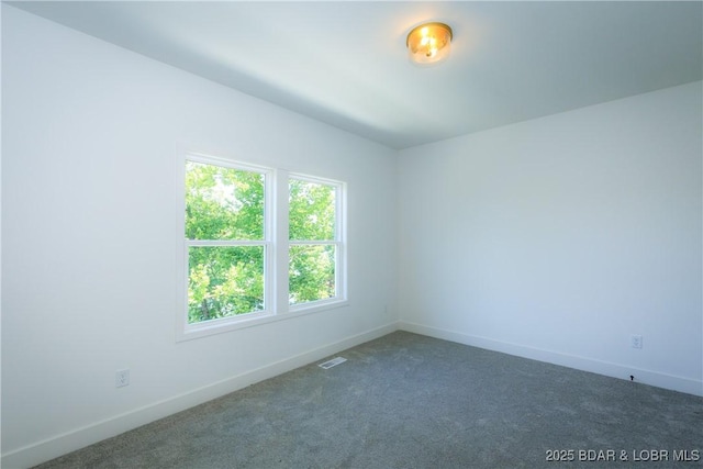 17023 Seminole Dr W, Rocky Mount, MO 65072 - carpeted spare room featuring baseboards