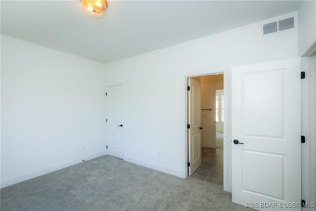17023 Seminole Dr W, Rocky Mount, MO 65072 - unfurnished bedroom featuring carpet flooring