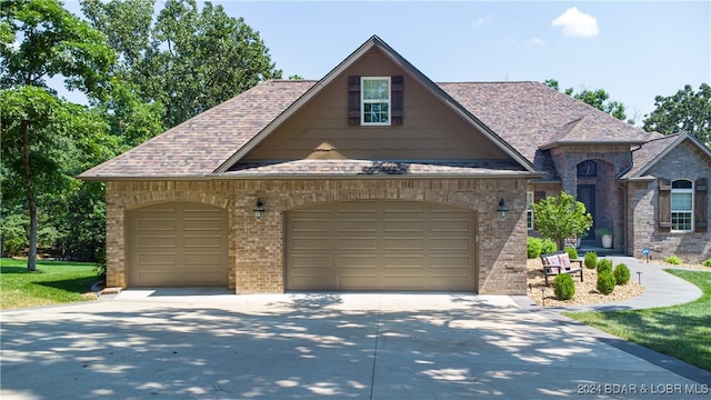 view of front of property featuring a garage