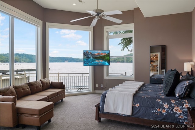 bedroom featuring carpet, ceiling fan, and access to exterior