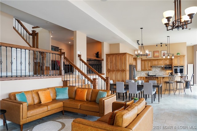 living room featuring an inviting chandelier