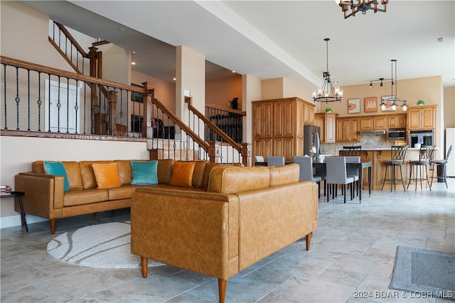 living room with an inviting chandelier