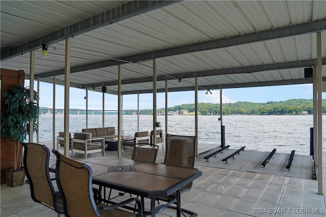 dock area with a water view