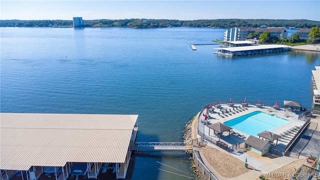 birds eye view of property featuring a water view