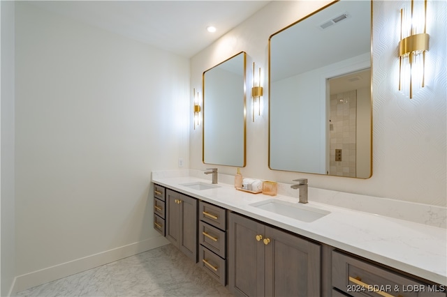 bathroom featuring vanity and tile patterned flooring