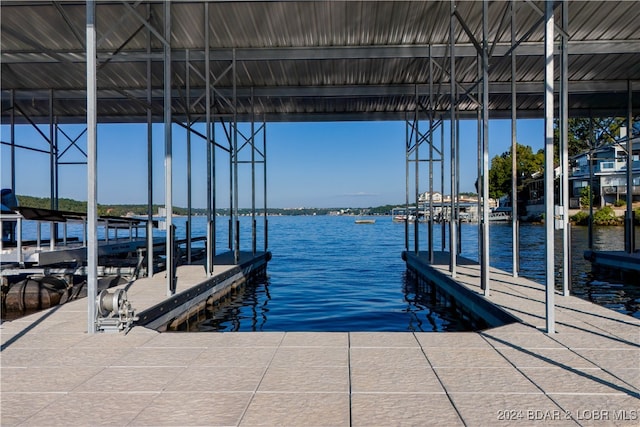 dock area featuring a water view