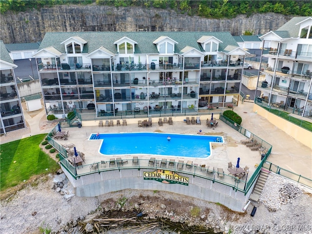 view of pool featuring a patio