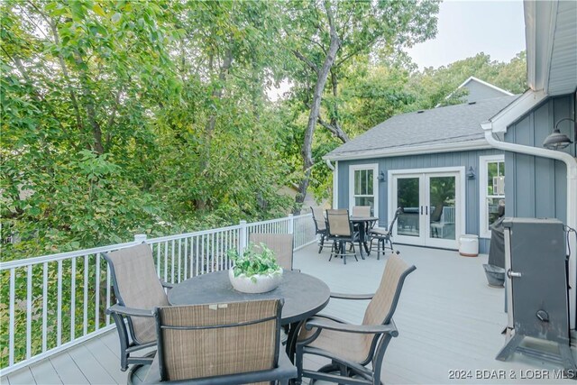 wooden terrace featuring french doors