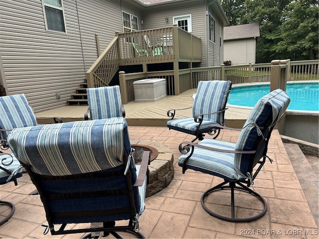 view of patio / terrace with a swimming pool side deck