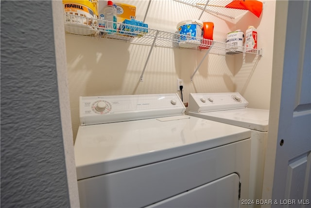 laundry room with washer and dryer