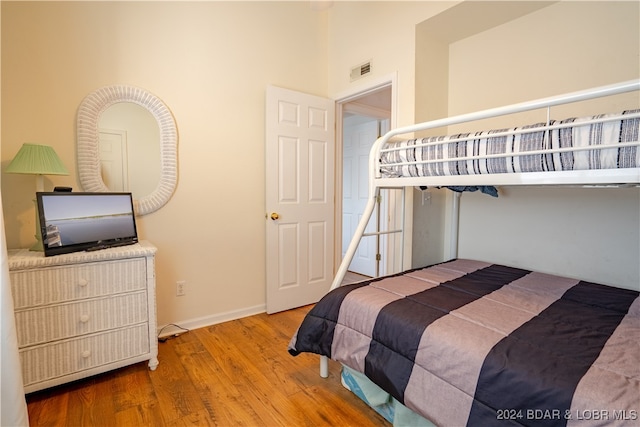 bedroom featuring hardwood / wood-style floors