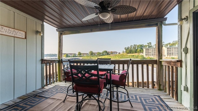 wooden terrace with ceiling fan