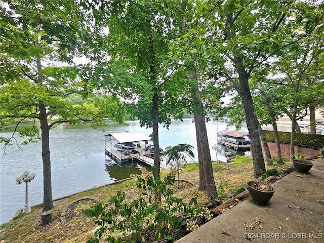 view of dock with a water view