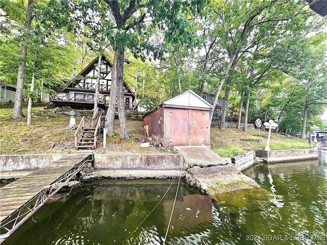 dock area with a water view