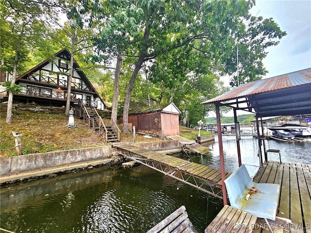 dock area with a water view