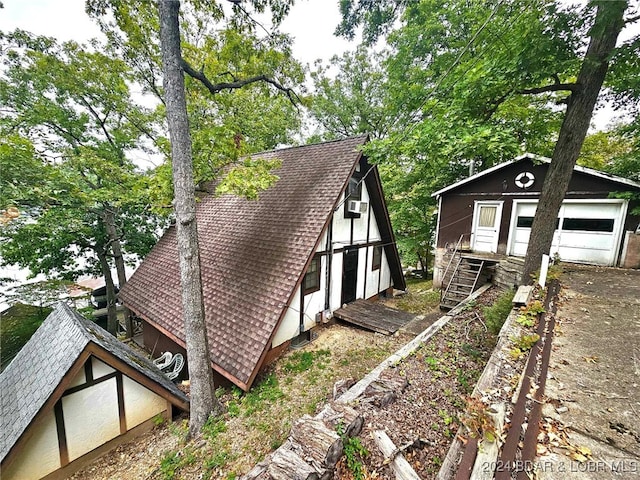 view of side of home with a garage