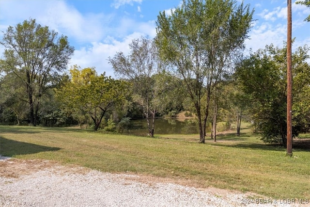 view of yard with a water view