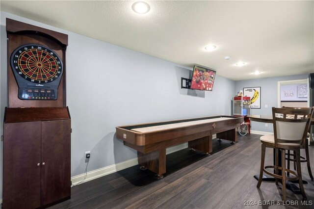 rec room with dark wood-style flooring, baseboards, and recessed lighting