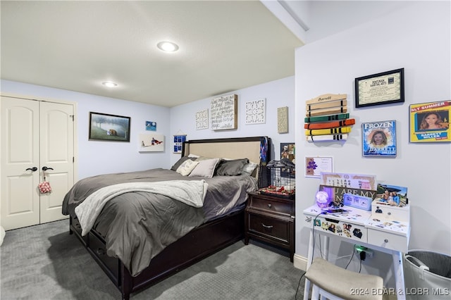 carpeted bedroom featuring a closet