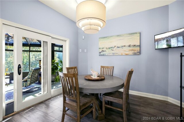 dining area featuring baseboards