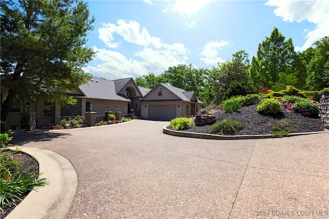 view of front of home with a garage