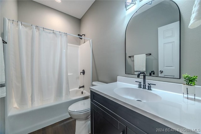 full bathroom featuring shower / tub combo, vanity, toilet, and wood-type flooring